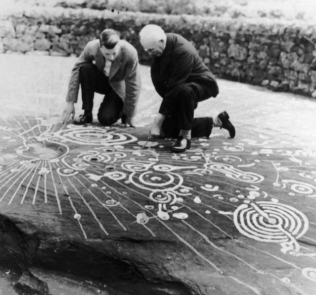 Ludovic Maclellan Mann examining the Cochno Stone